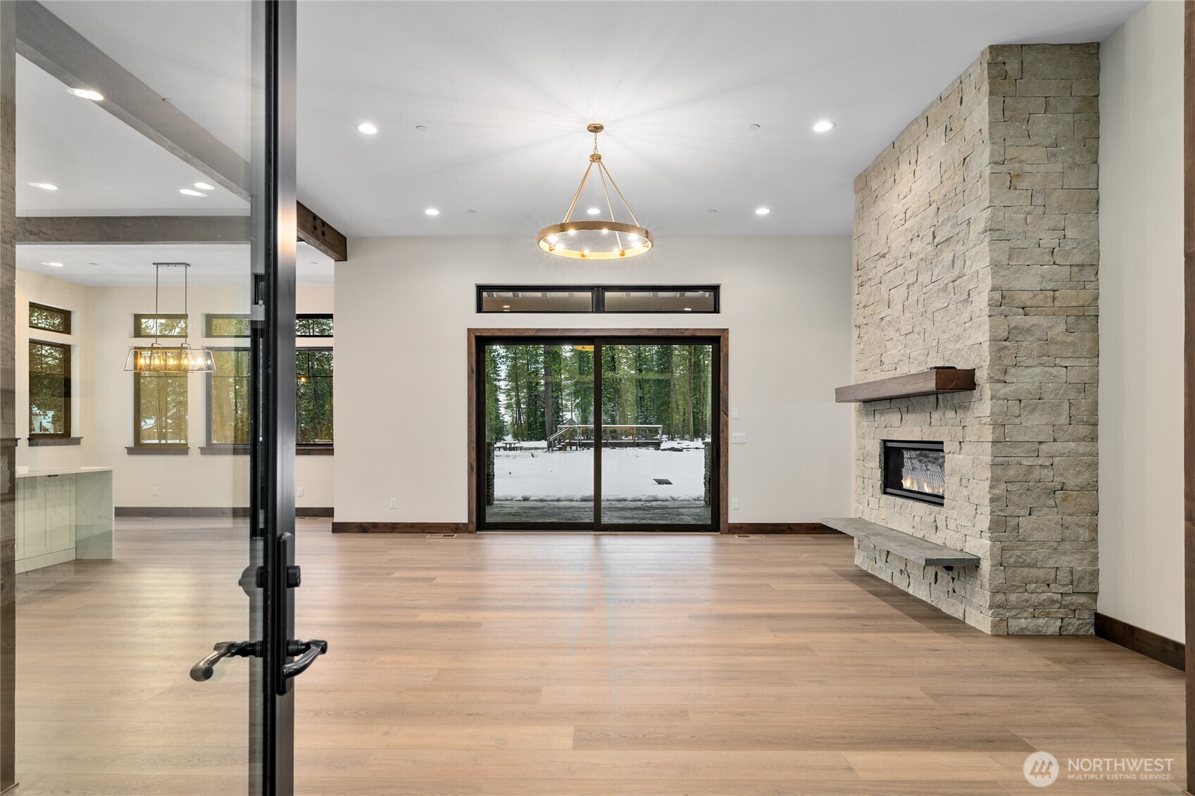 581 Wanawish Loop Cle Elum, WA 98922 - Photo 4 of 40 a view of an empty room with a fireplace and a window
