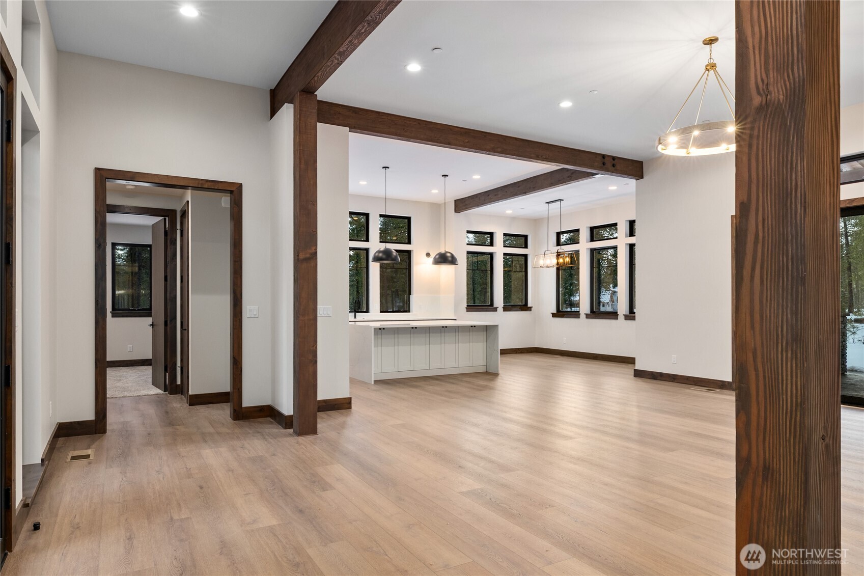 581 Wanawish Loop Cle Elum, WA 98922 - Photo 7 of 40 an empty room with wooden floor and windows