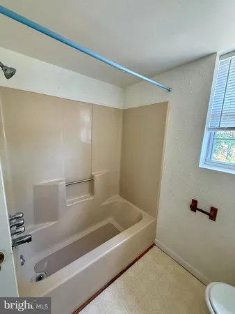 a bathroom with a bathtub