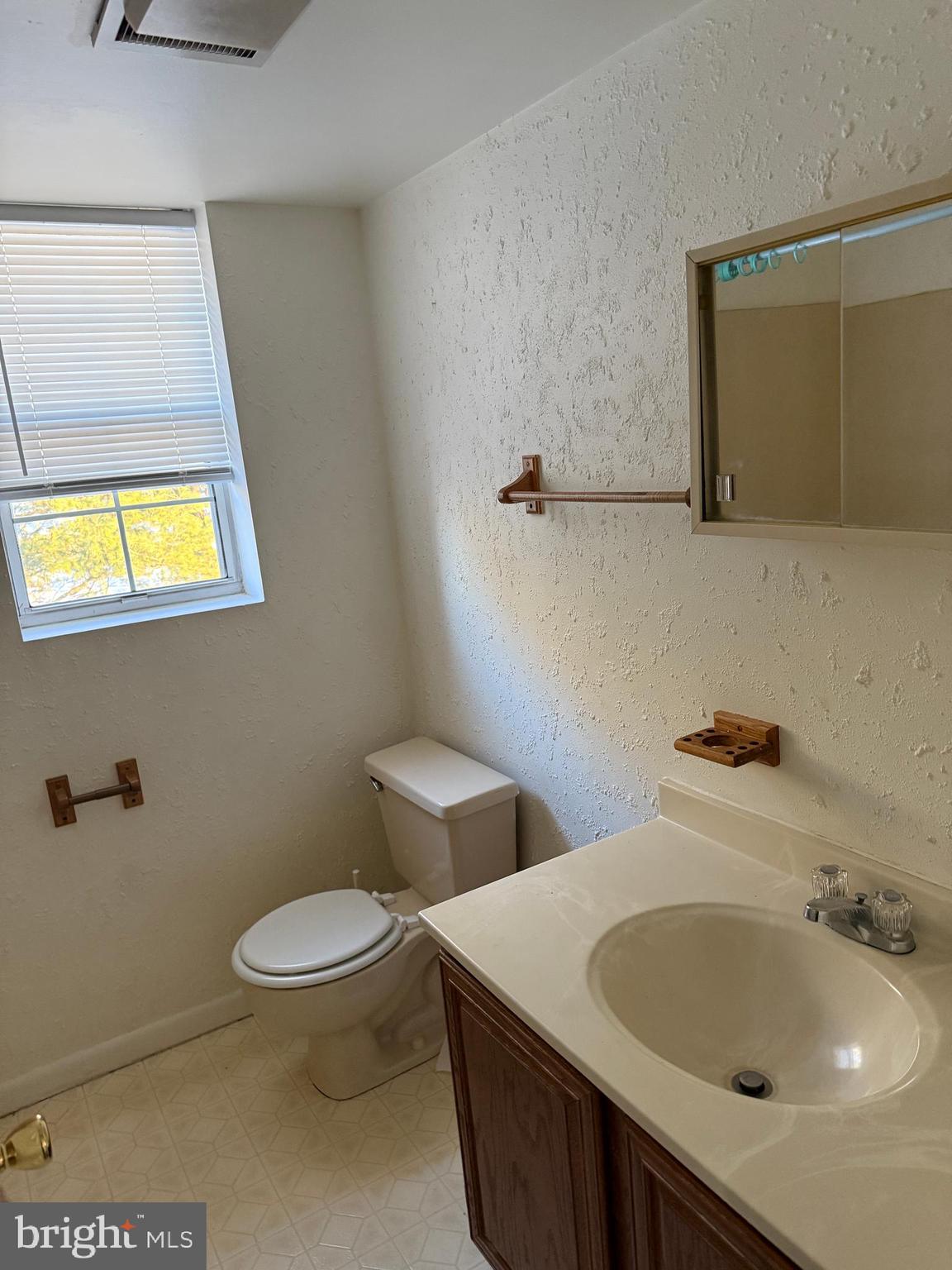 101 North Caroline Place Dover, DE 19904 - Photo 29 of 31 a bathroom with a sink and a toilet