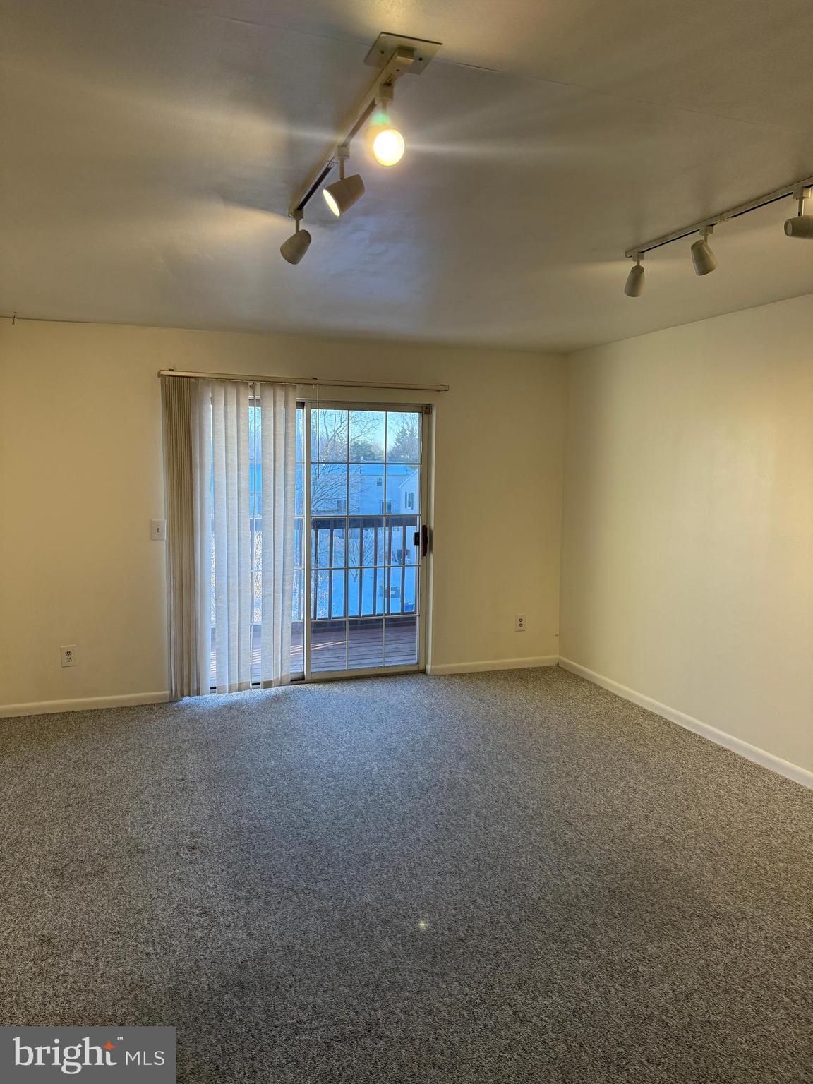 101 North Caroline Place Dover, DE 19904 - Photo 5 of 31 a view of an empty room with a window