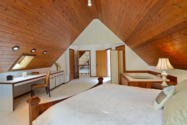 a view of sitting area in front of a bathroom