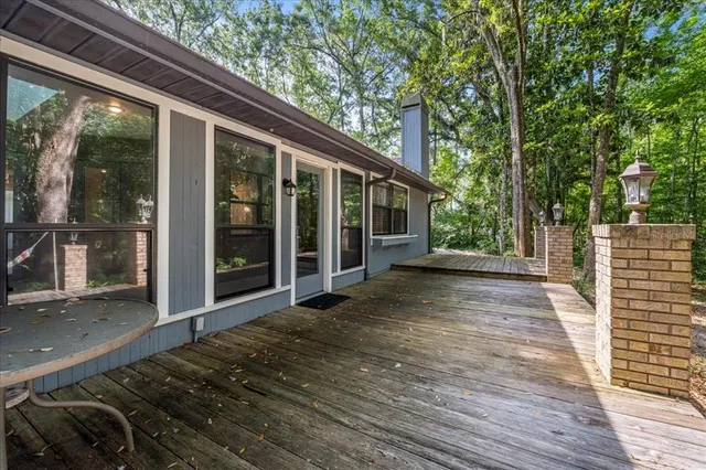 a view of backyard with green space