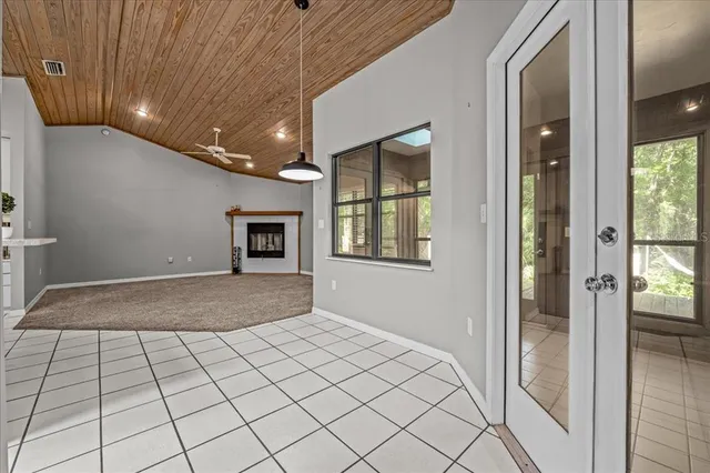 a view of an empty room and window