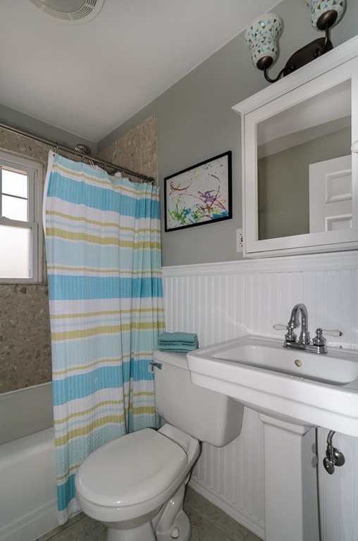 15 Ferndale Road Natick, MA 01760 - Photo 11 of 20 a bathroom with a sink a toilet and shower