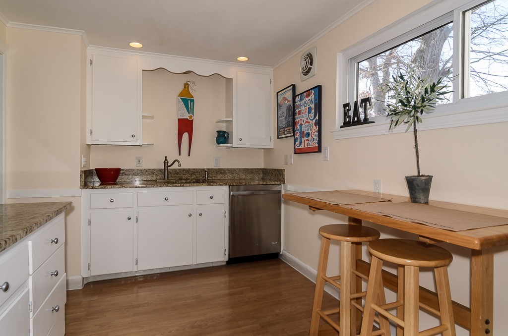 15 Ferndale Road Natick, MA 01760 - Photo 5 of 20 a kitchen with a stove a sink and a refrigerator