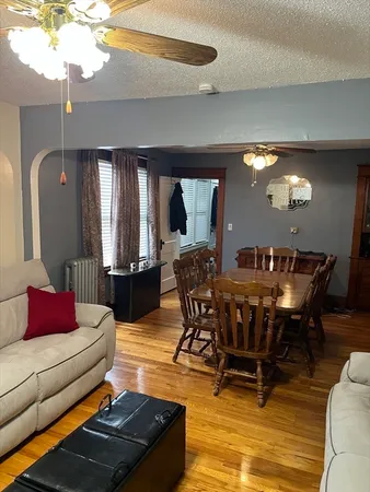 a kitchen with stove and cabinets