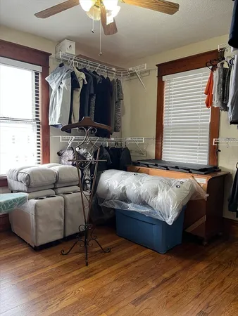 a table chair sitting in a kitchen next to a window