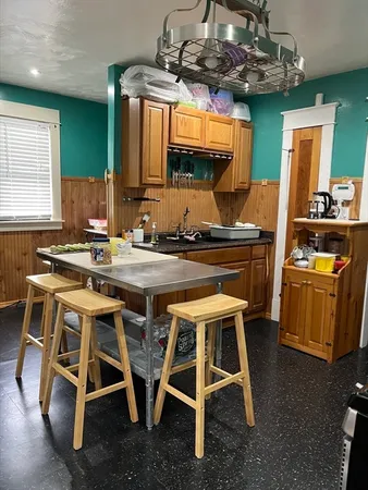 a room with furniture and a window