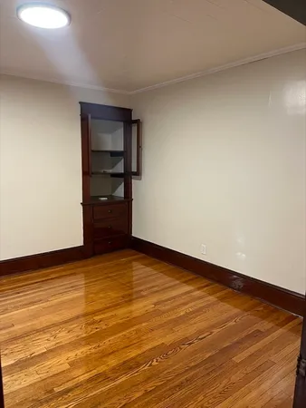 a view of an empty room and closet