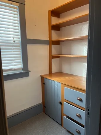 a view of storage and utility room with washer and dryer