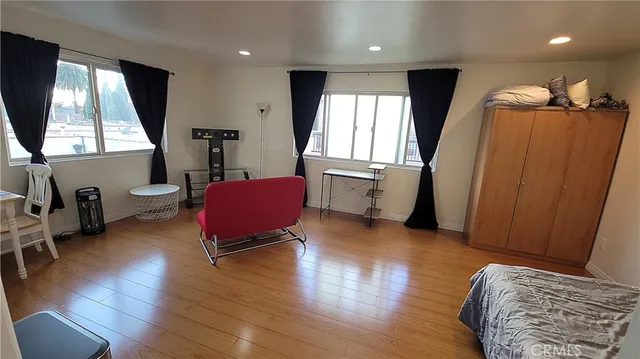 a dining room with furniture window wooden floor