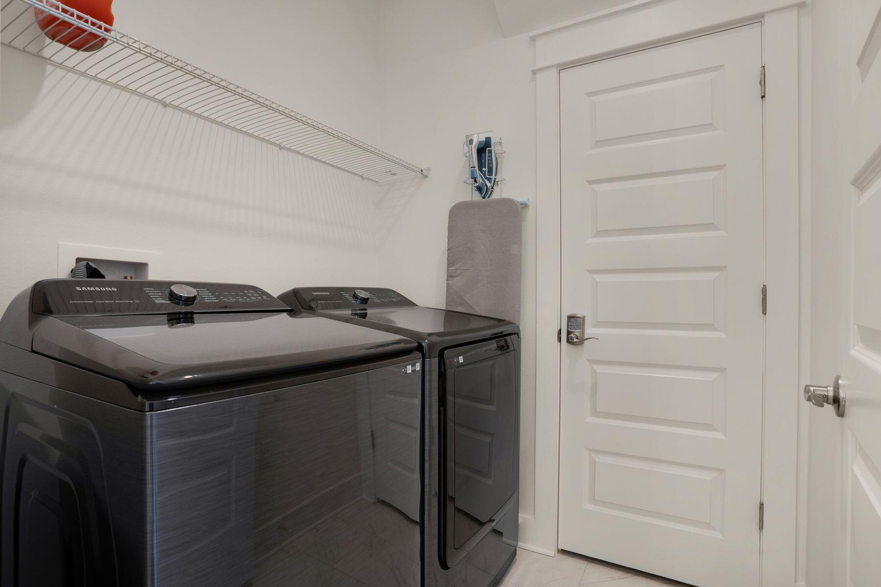 110 Wharf Ln Inlet Beach, Unit A Inlet Beach, FL 32461 - Photo 26 of 27 a utility room with washer and dryer