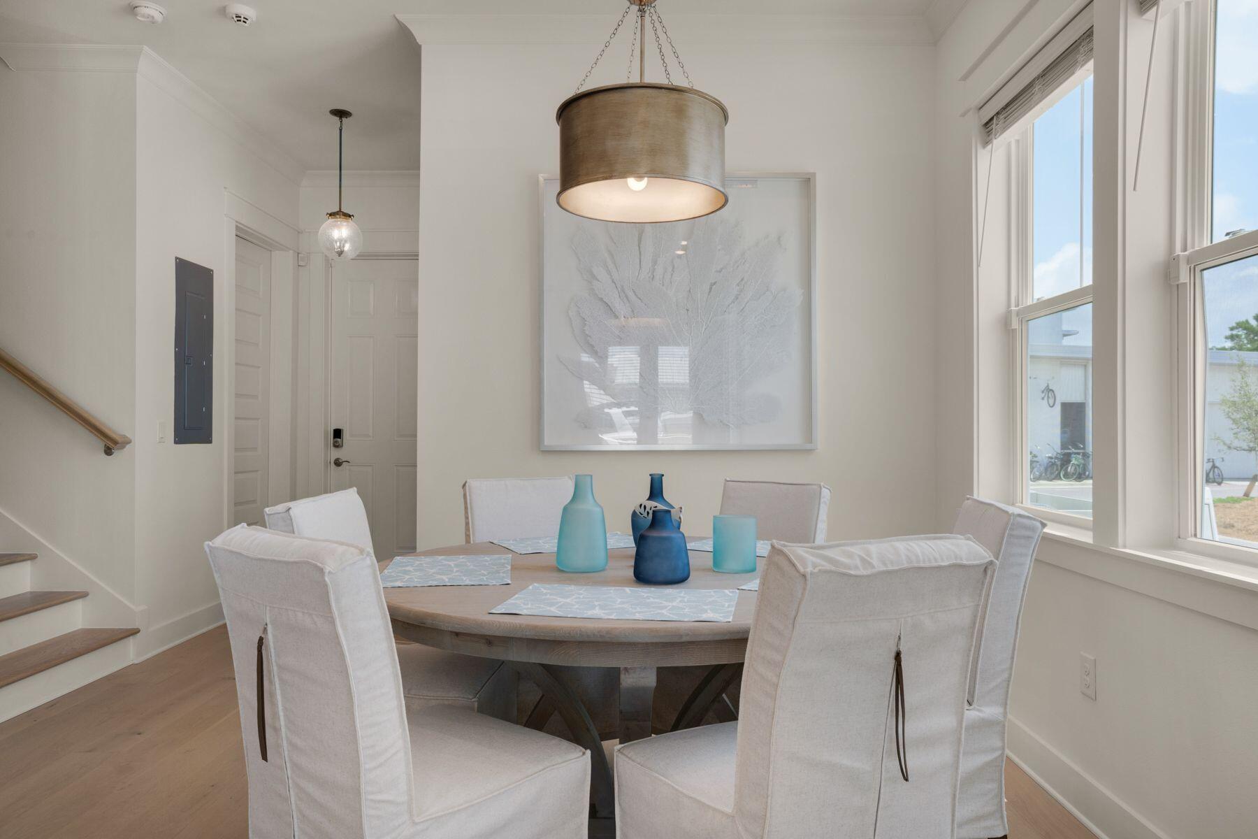 110 Wharf Ln Inlet Beach, Unit A Inlet Beach, FL 32461 - Photo 9 of 27 a dining room with furniture and window