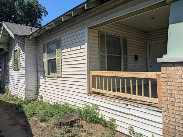 a view of a house with a deck