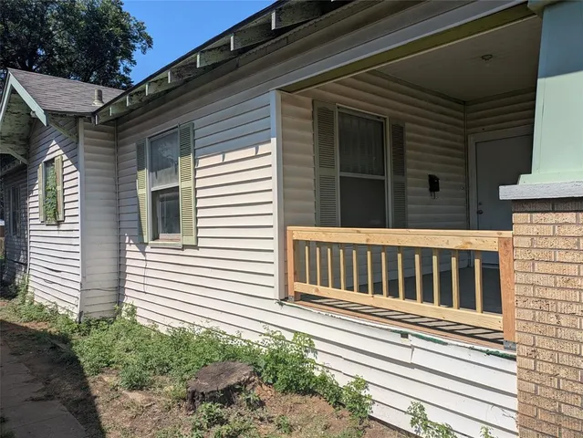 a view of a house with a deck