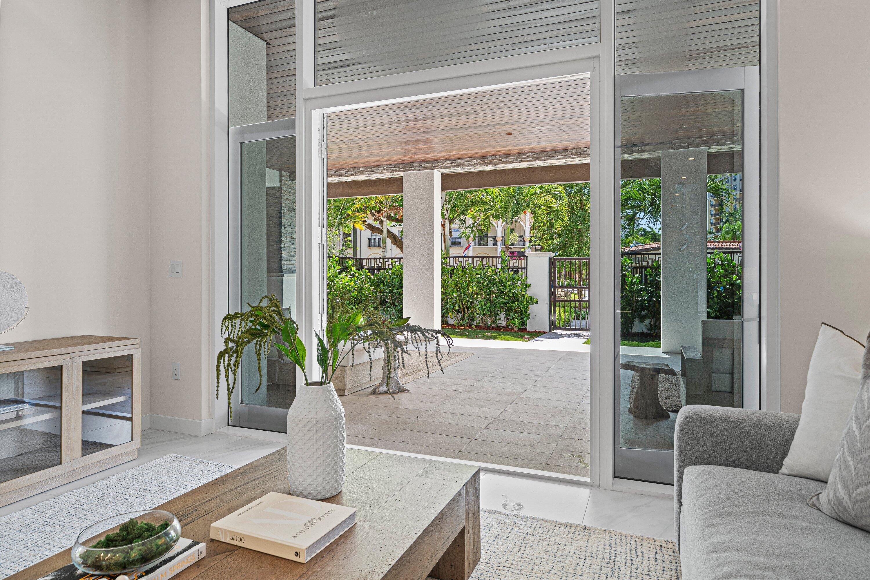 220 Southeast Mizner Boulevard, Unit 102 Boca Raton, FL 33432 - Photo 10 of 55 Living Room/Terrace