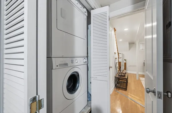 a view of hallway with washer and dryer