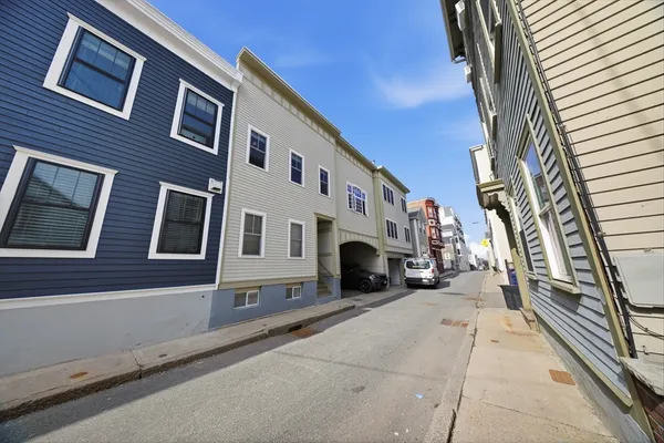 a view of a house with a street