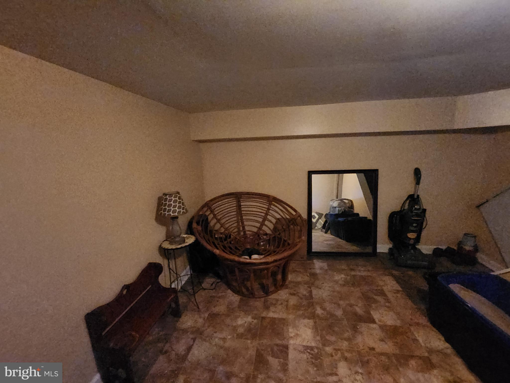 2843 Bookert Drive Baltimore, MD 21225 - Photo 15 of 17 a room with a large mirror and a sink
