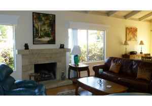 55 North San Marcos Road Santa Barbara, CA 93111 - Photo 1 of 4 a living room with furniture and a fireplace