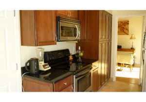 55 North San Marcos Road Santa Barbara, CA 93111 - Photo 2 of 4 a kitchen with a sink and cabinets