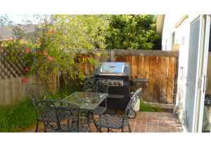55 North San Marcos Road Santa Barbara, CA 93111 - Photo 3 of 4 a backyard of a house with table and chairs