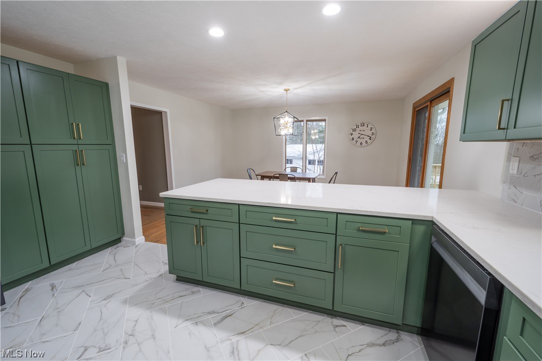 9980 Chardon Road Chardon, OH 44024 - Photo 12 of 46 Quartz Eat-at Island with matching dishwasher