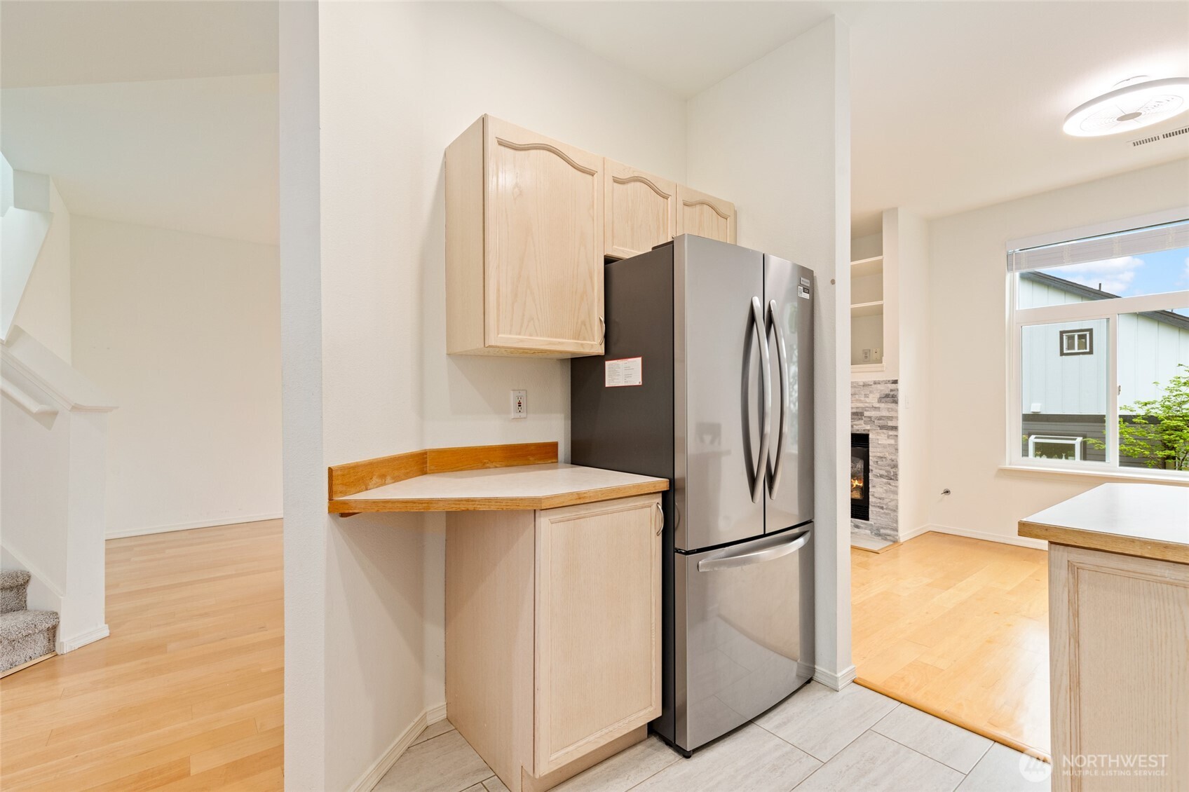 22619 4th Avenue West, Unit 3103 Bothell, WA 98021 - Photo 6 of 26 a kitchen with stainless steel appliances a refrigerator and a sink