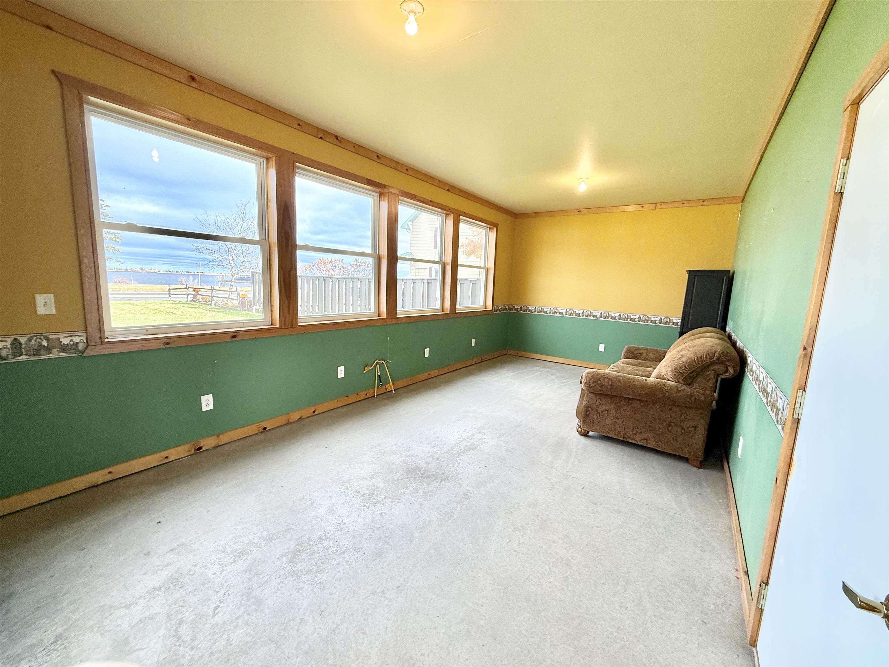 402 East 2nd Street Superior, WI 54880 - Photo 8 of 35 Great bonus entertainment space, or a relaxing hideaway. Bright and sunny with beautiful views of Lake Superior.