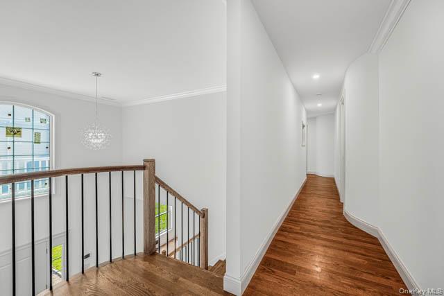 1 Kewanee Road New Rochelle, NY 10804 - Photo 24 of 36 a view of a hallway with wooden floor