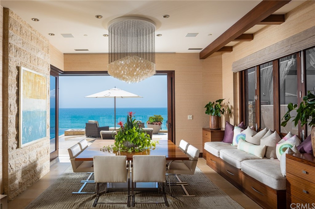 33 Strand Beach Drive Dana Point, CA 92629 - Photo 11 of 54 a living room with furniture and a chandelier
