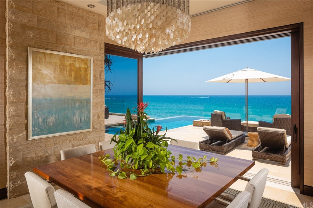 33 Strand Beach Drive Dana Point, CA 92629 - Photo 12 of 54 a outdoor living space with furniture and umbrella