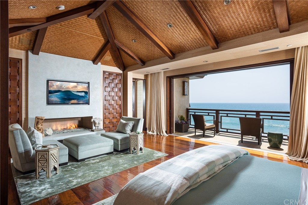 33 Strand Beach Drive Dana Point, CA 92629 - Photo 18 of 54 a living room with furniture and a floor to ceiling window