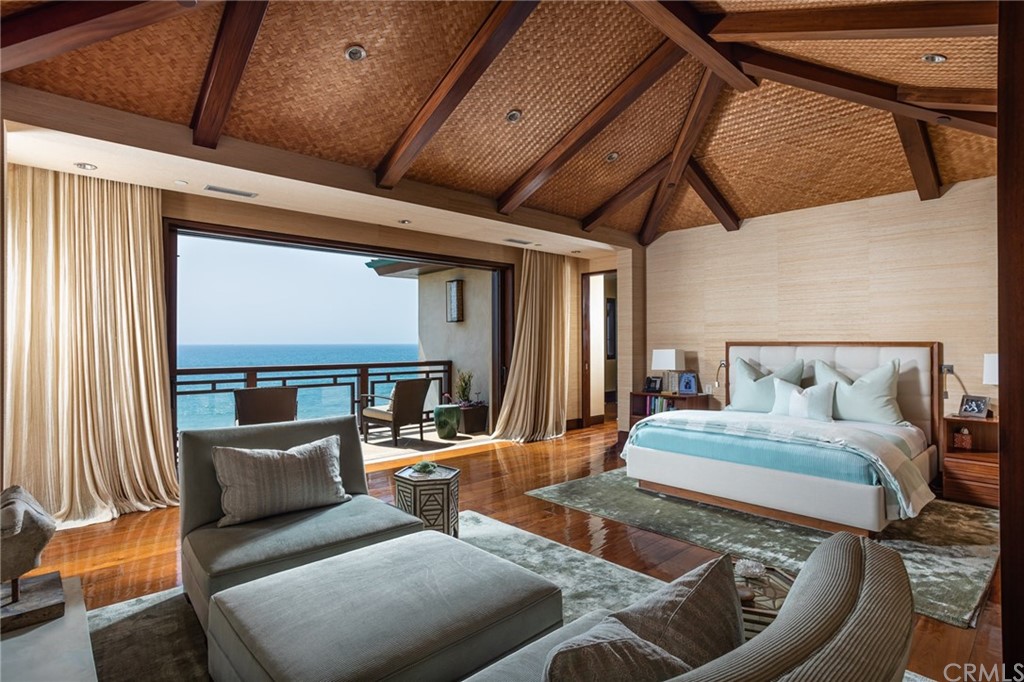 33 Strand Beach Drive Dana Point, CA 92629 - Photo 19 of 54 a bedroom with furniture and a large window