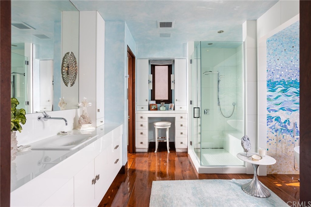 33 Strand Beach Drive Dana Point, CA 92629 - Photo 21 of 54 a spacious bathroom with a tub shower and mirror