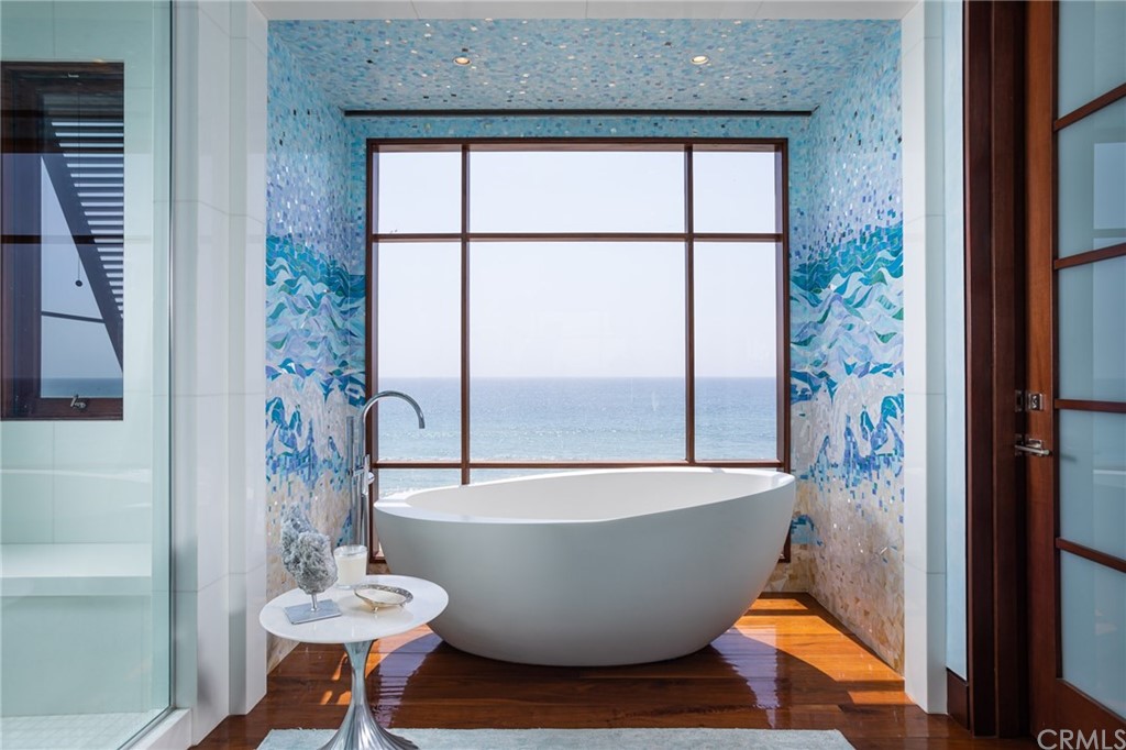 33 Strand Beach Drive Dana Point, CA 92629 - Photo 22 of 54 a white tub sitting next to a window