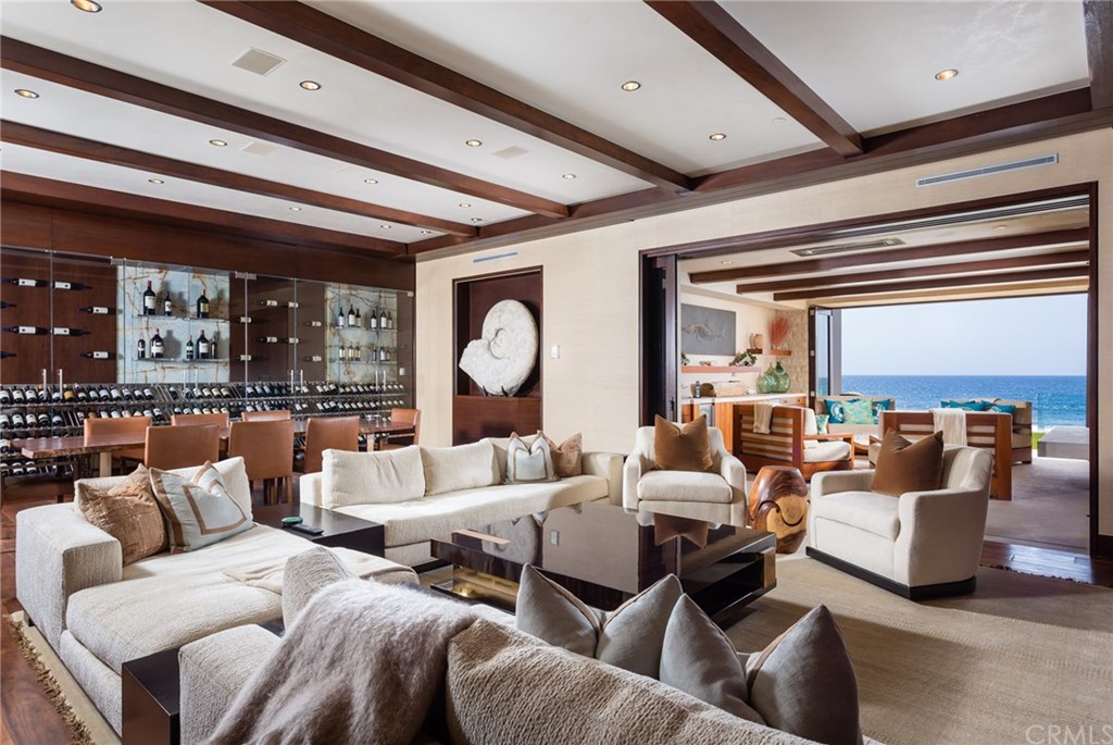 33 Strand Beach Drive Dana Point, CA 92629 - Photo 33 of 54 a living room with furniture and a large window
