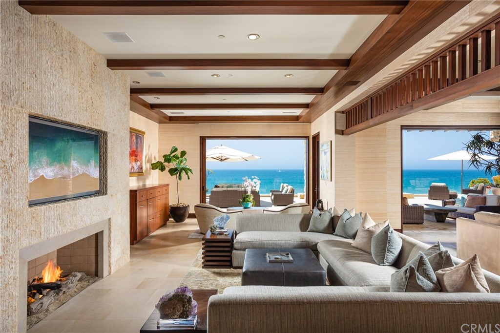 33 Strand Beach Drive Dana Point, CA 92629 - Photo 7 of 54 a living room with furniture and a fireplace