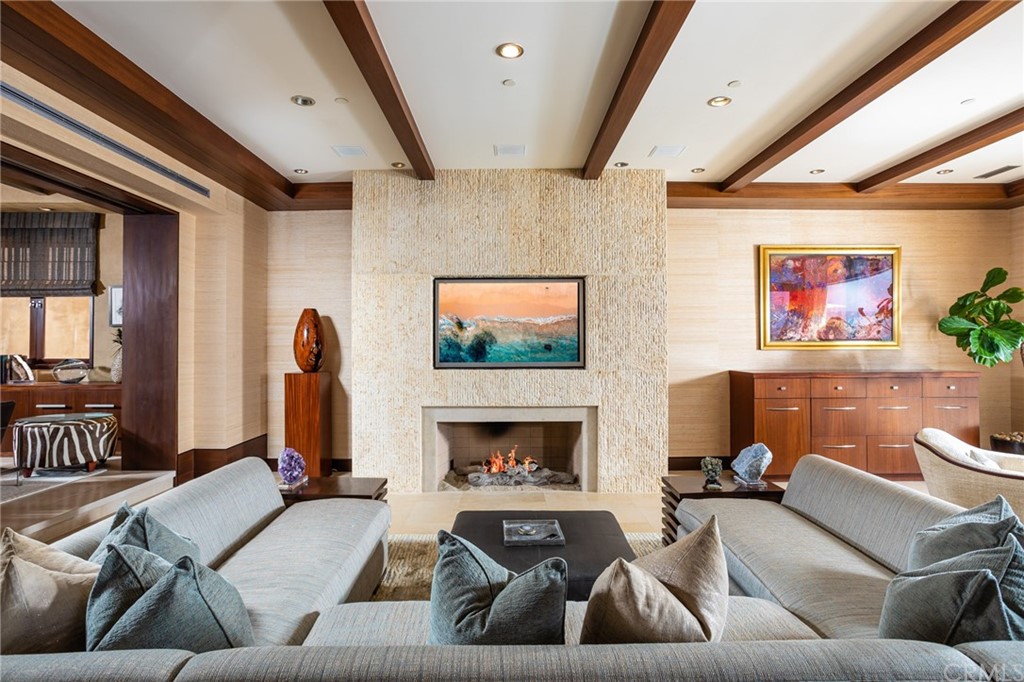 33 Strand Beach Drive Dana Point, CA 92629 - Photo 8 of 54 a living room with furniture and a fireplace