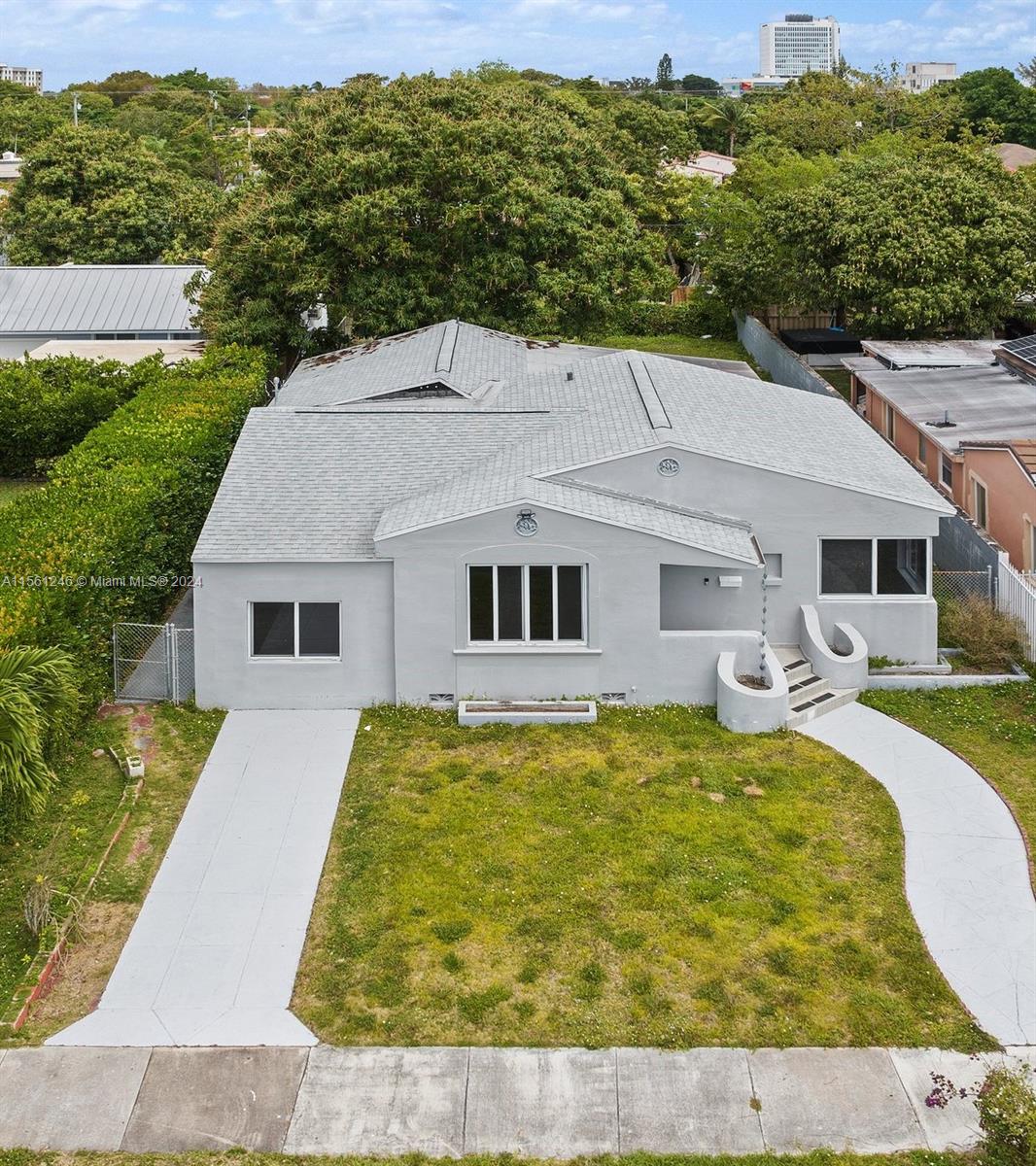 2733 Southwest 15th Street Miami, FL 33145 - Photo 2 of 34 a aerial view of house with yard