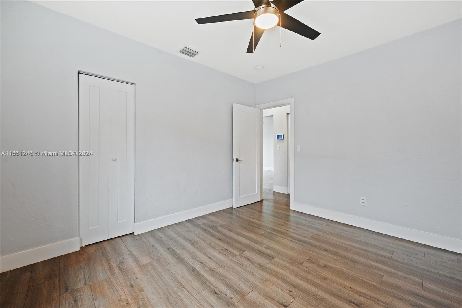 2733 Southwest 15th Street Miami, FL 33145 - Photo 25 of 34 a view of an empty room with wooden floor