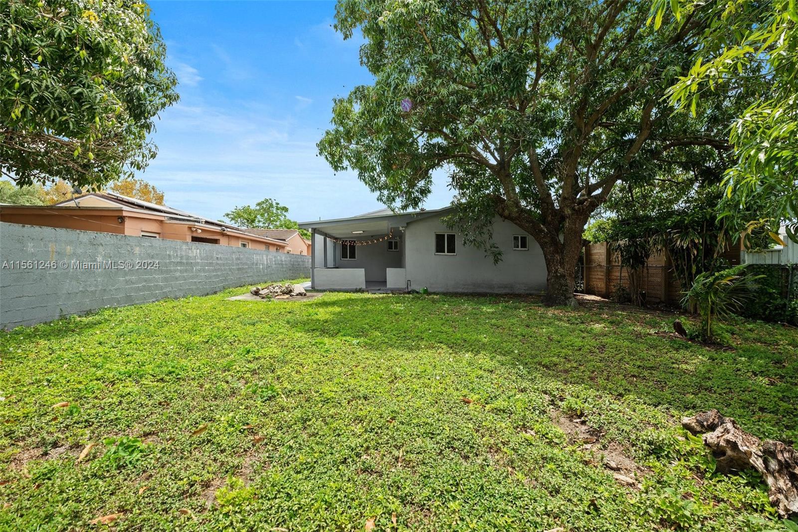 2733 Southwest 15th Street Miami, FL 33145 - Photo 30 of 34 a view of a house with backyard and sitting area