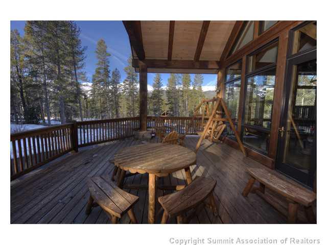 6 Rounds Road Breckenridge, CO 80424 - Photo 12 of 25 a view of a patio with table and chairs with wooden floor