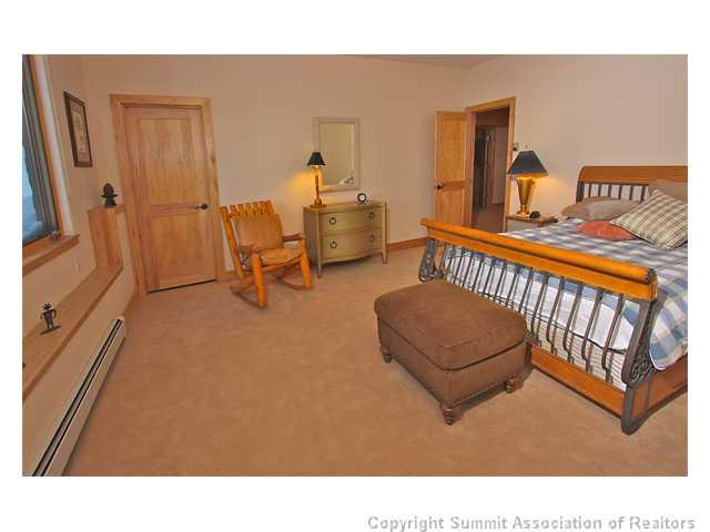 6 Rounds Road Breckenridge, CO 80424 - Photo 13 of 25 a living room with furniture and a flat screen tv