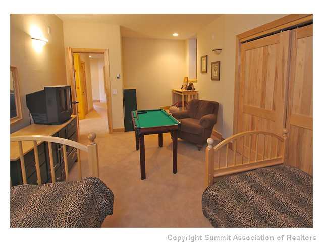 6 Rounds Road Breckenridge, CO 80424 - Photo 18 of 25 a living room with furniture and a wooden floor