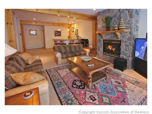6 Rounds Road Breckenridge, CO 80424 - Photo 20 of 25 a living room with furniture and a fireplace