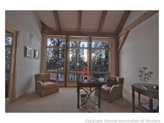 6 Rounds Road Breckenridge, CO 80424 - Photo 7 of 25 a living room with furniture and a floor to ceiling window