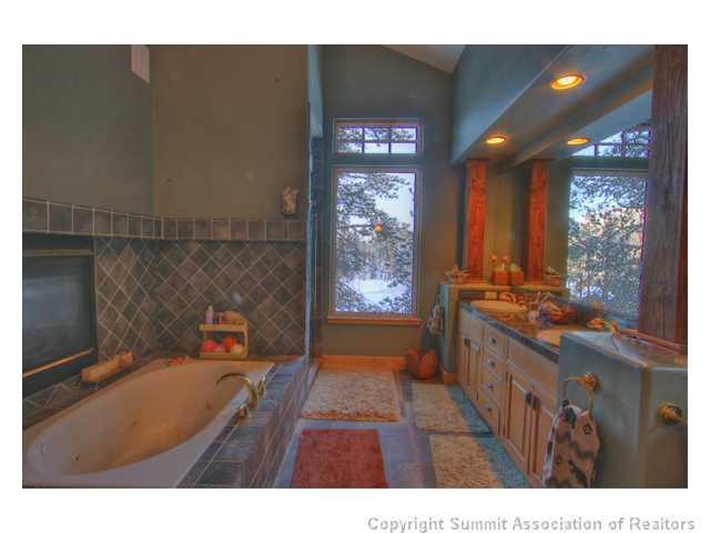 6 Rounds Road Breckenridge, CO 80424 - Photo 9 of 25 a bathroom with a sink and a mirror