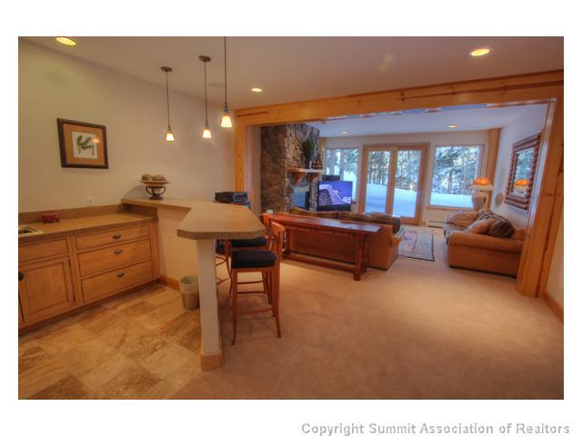 6 Rounds Road Breckenridge, CO 80424 - Photo 10 of 25 a living room with furniture a flat screen tv and a window